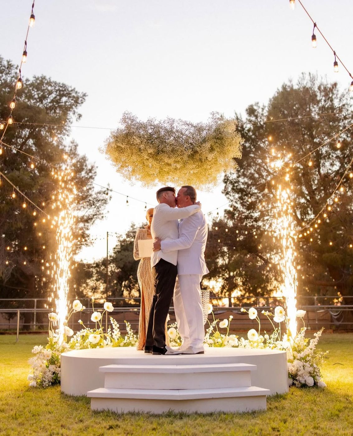 Cold spark fountains beside a first dance