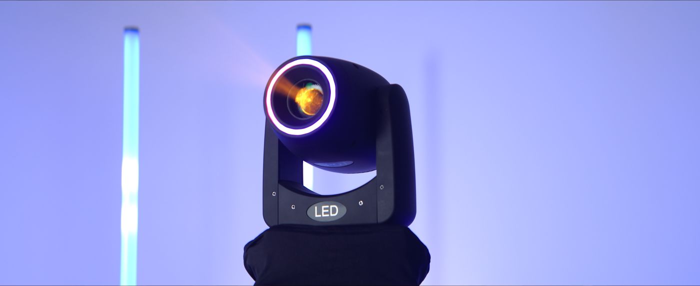 Moving head light with a glowing beam