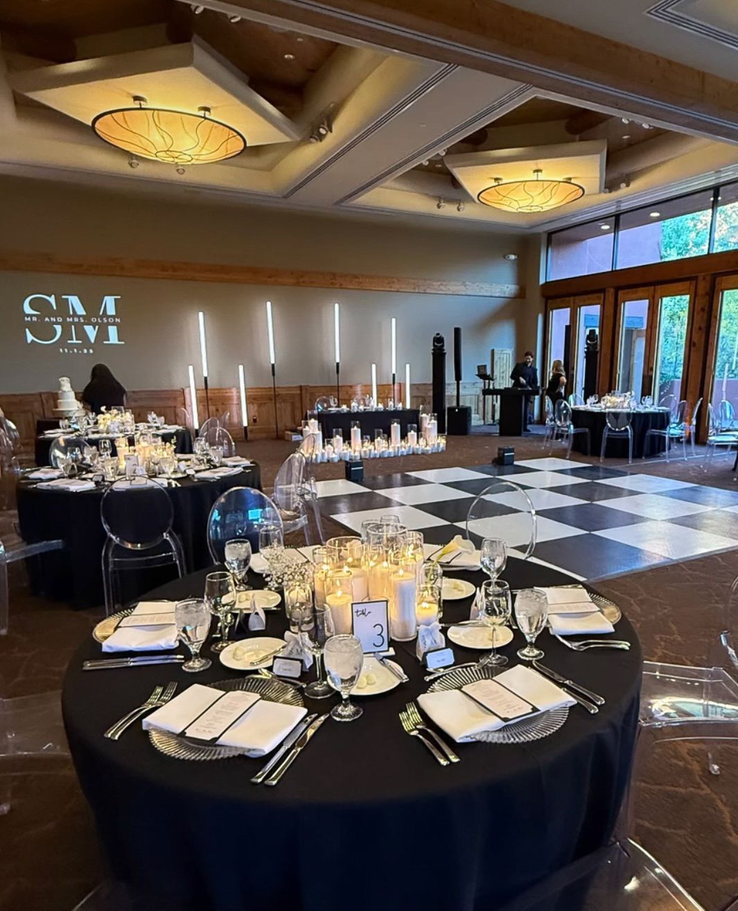 A couple monogram projected on the dance floor