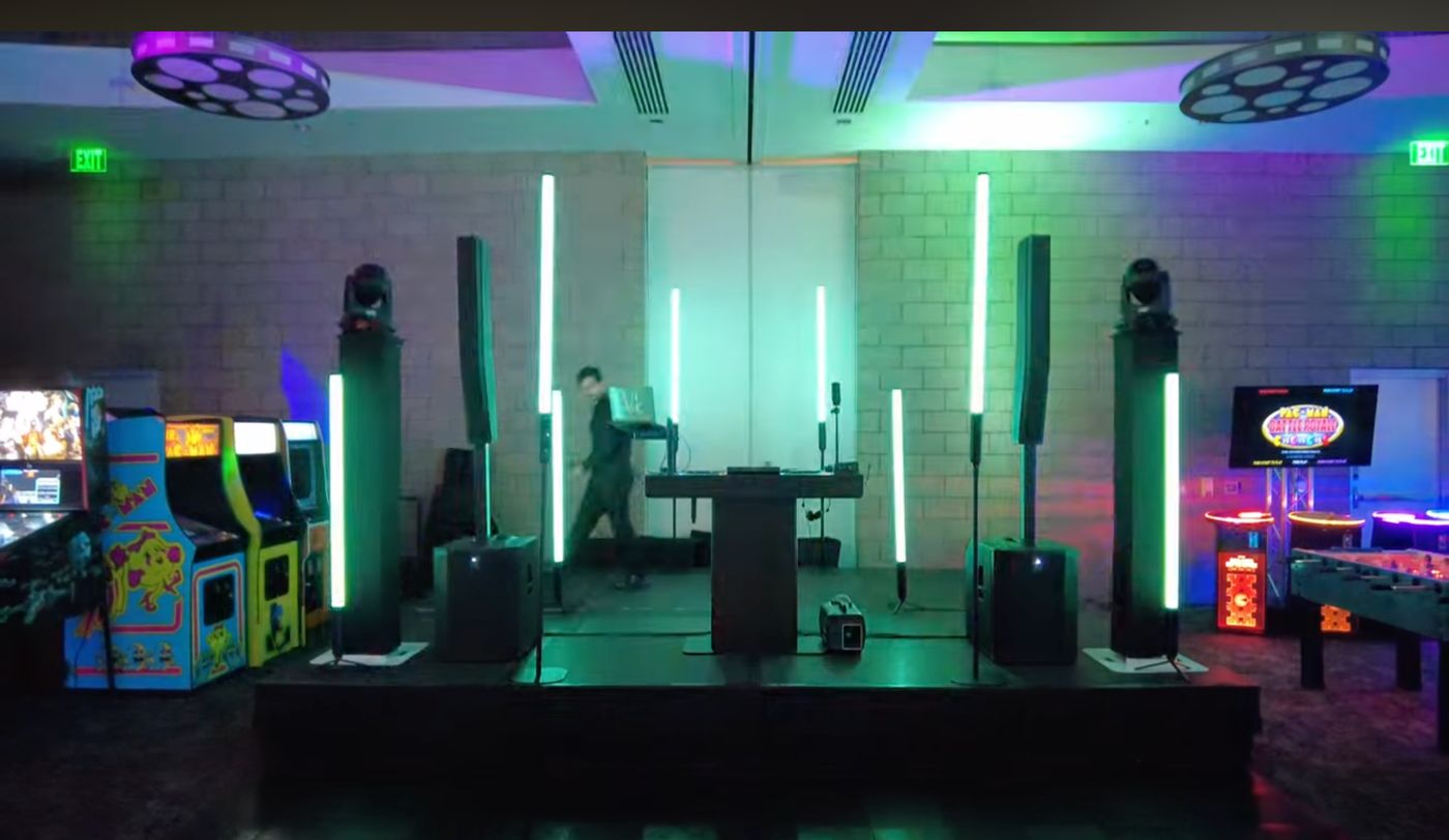 LED tubes and moving head lights cutting through haze