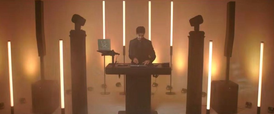 Erik mixing at the DJ booth