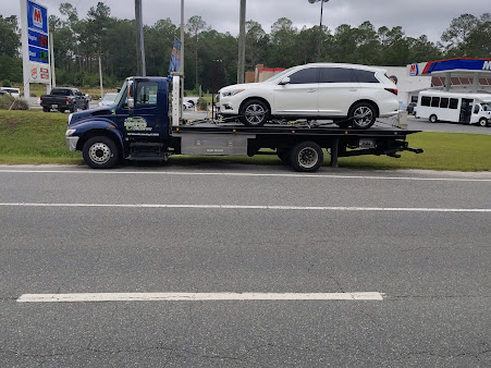 Moffo's Towing and Repair wrecker on an overnight tow call
