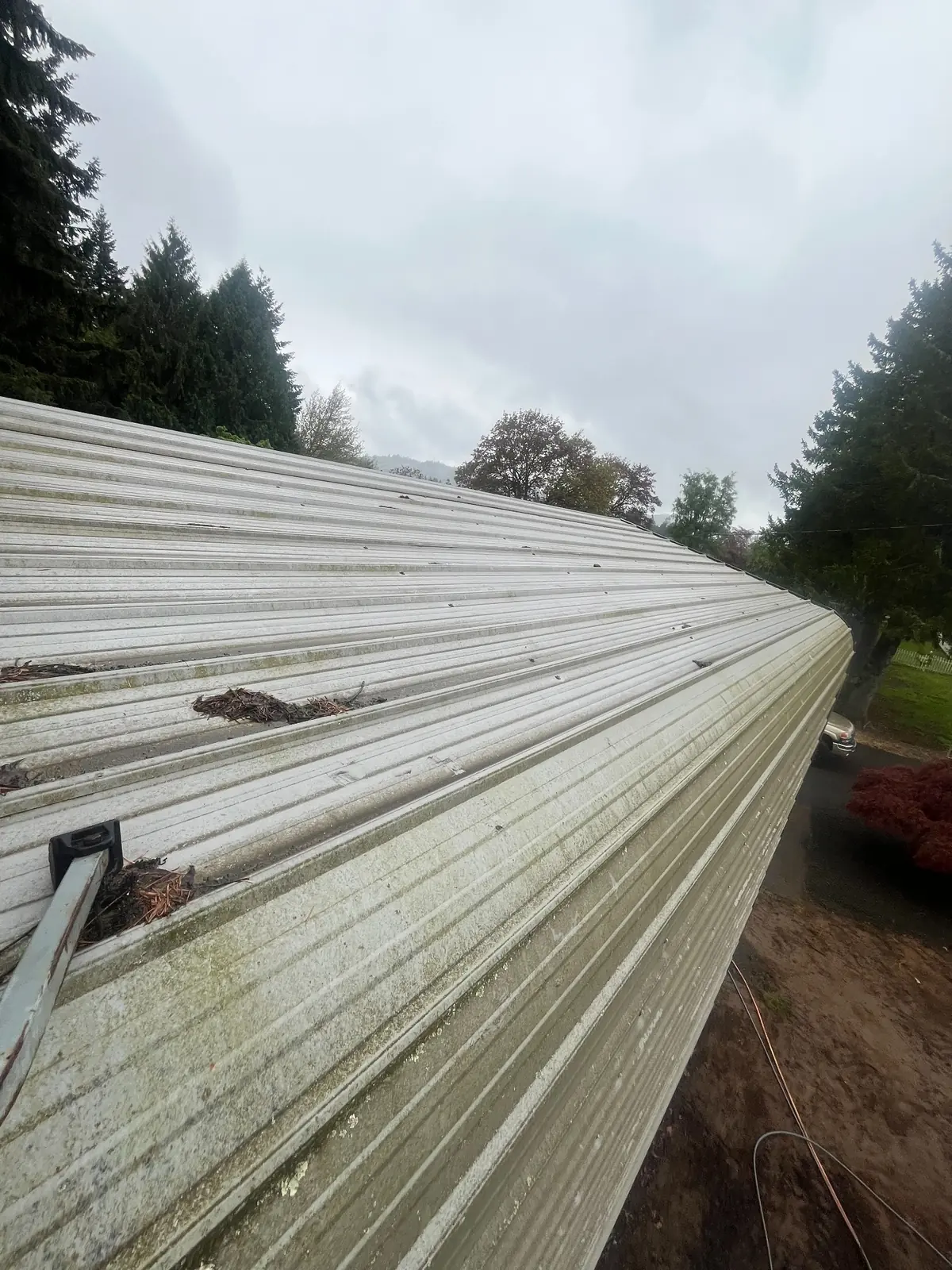 Before: metal roof pressure washing