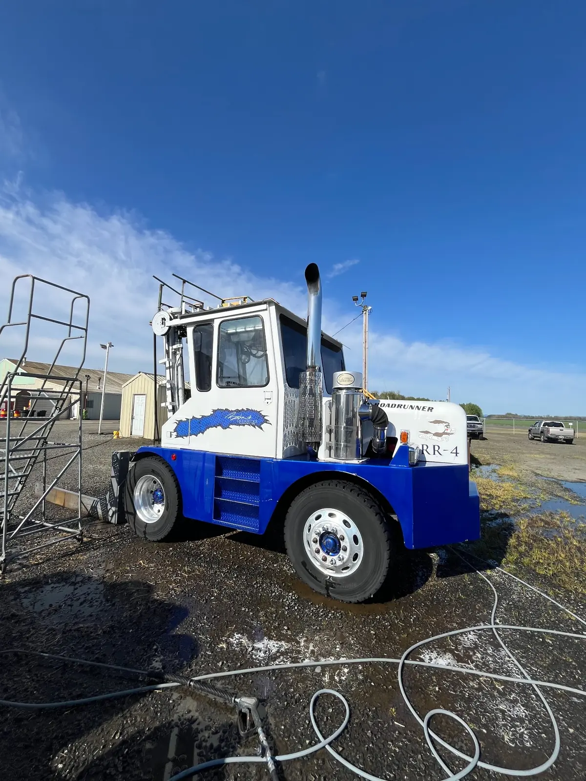 After: Blue-and-white yard tractor exterior washing before and after in Salem, OR