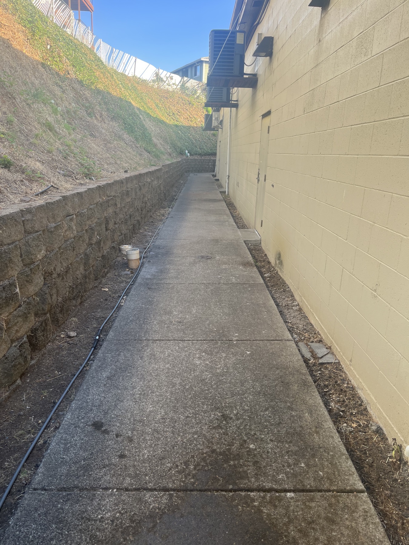 Before: Commercial building walkway pressure washing before and after in Salem, OR