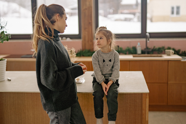 Child listening to adult Child listening to adult