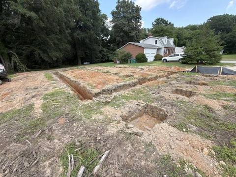 4140 Terminal Ave, Jul 26, 2026: excavated footing trenches on the lot