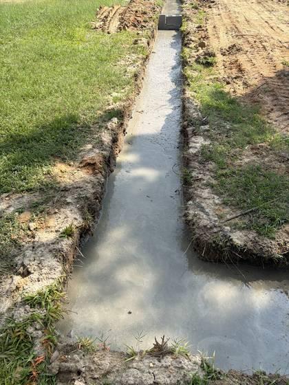 4140 Terminal Ave, Jul 29, 2026: poured concrete footings and first block courses