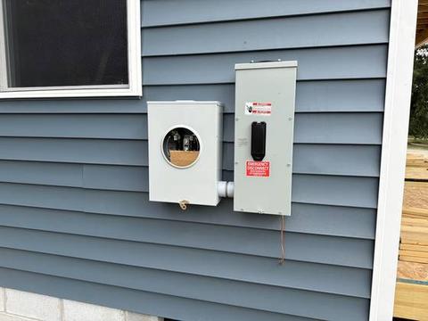 4140 Terminal Ave, Sep 29, 2026: exterior electrical meter and disconnect on blue siding