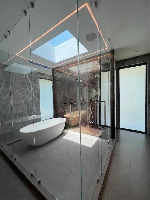 Primary bathroom with the windows switched to private
