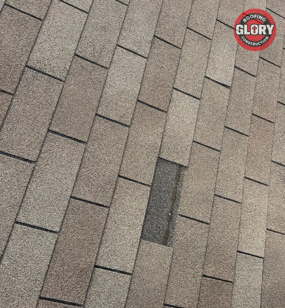 Missing shingle tab found during a roof inspection