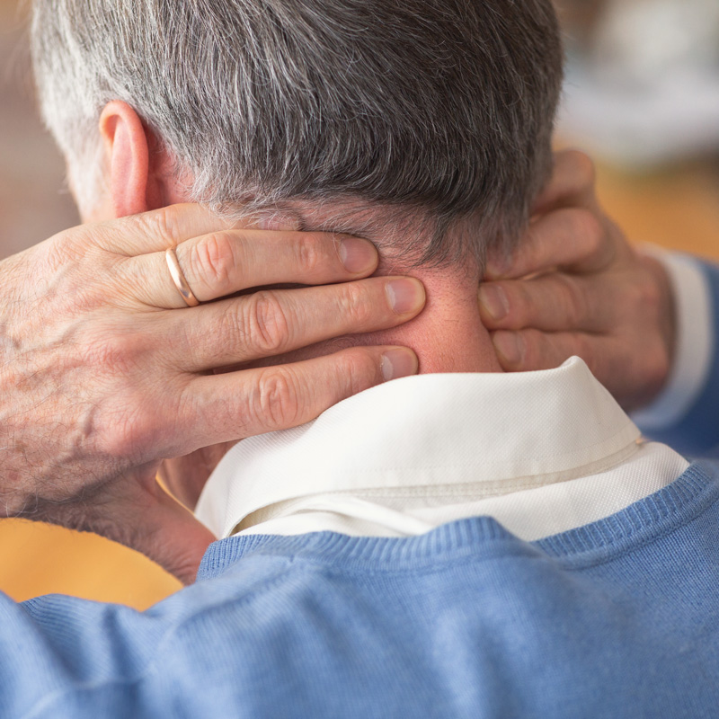 Dr. Robin Ure providing chiropractic consultation to patients at Power Within Chiropractic in Amarillo, TX.