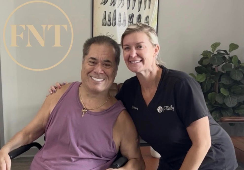 A Trinity Dental Arts patient smiling at their new teeth