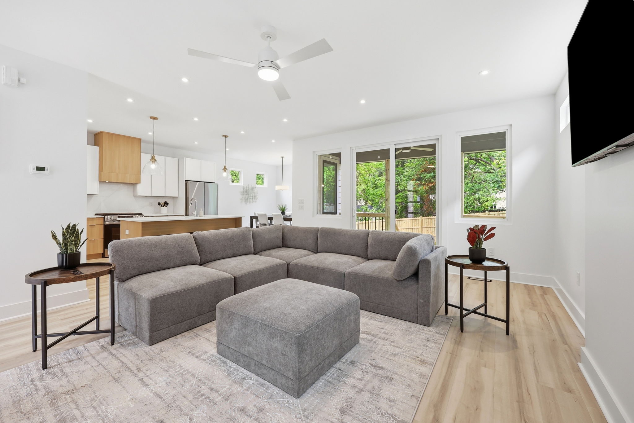 Sunlit living room with open floor plan