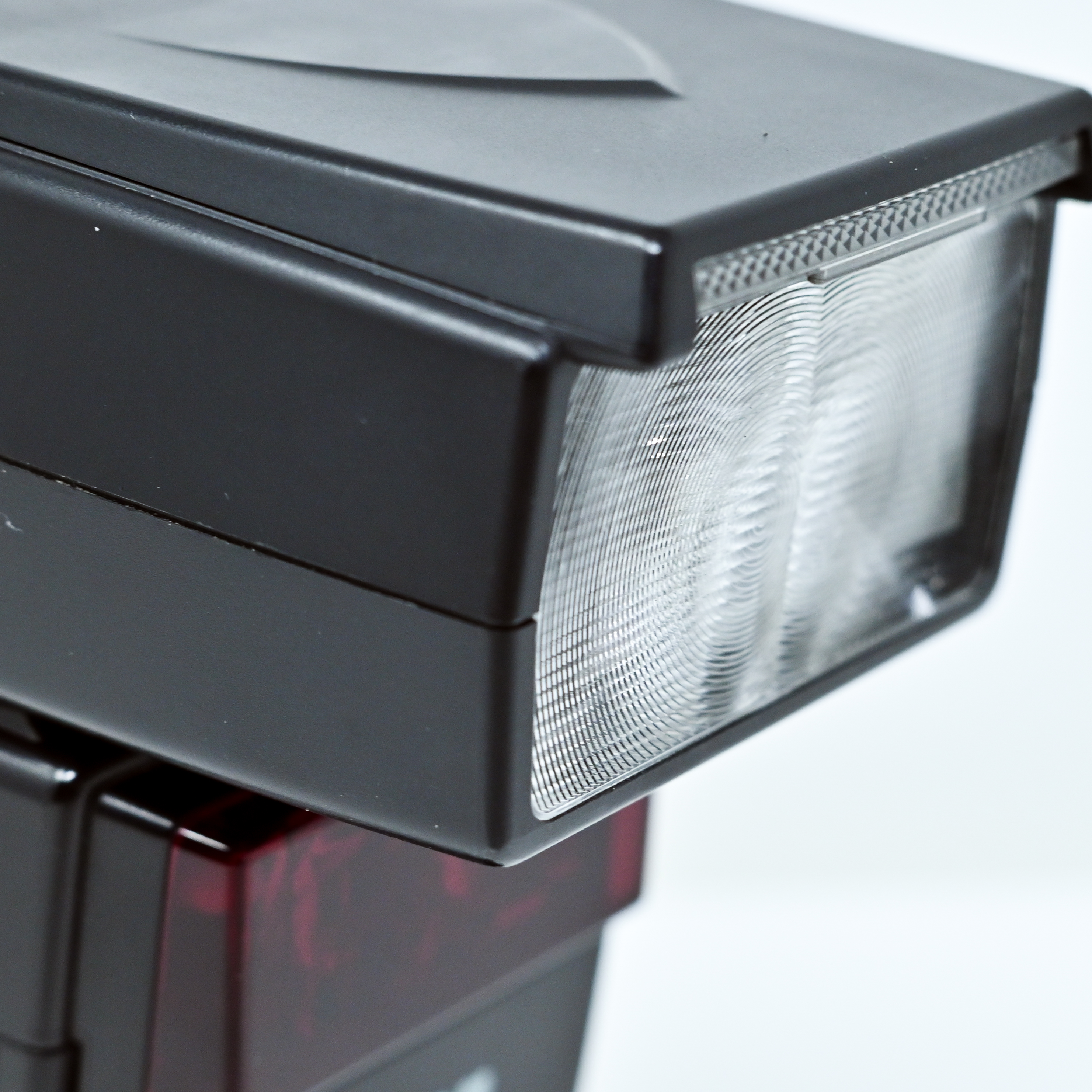 close-up photo of a speed light (camera flash) close-up photo of a speed light (camera flash)