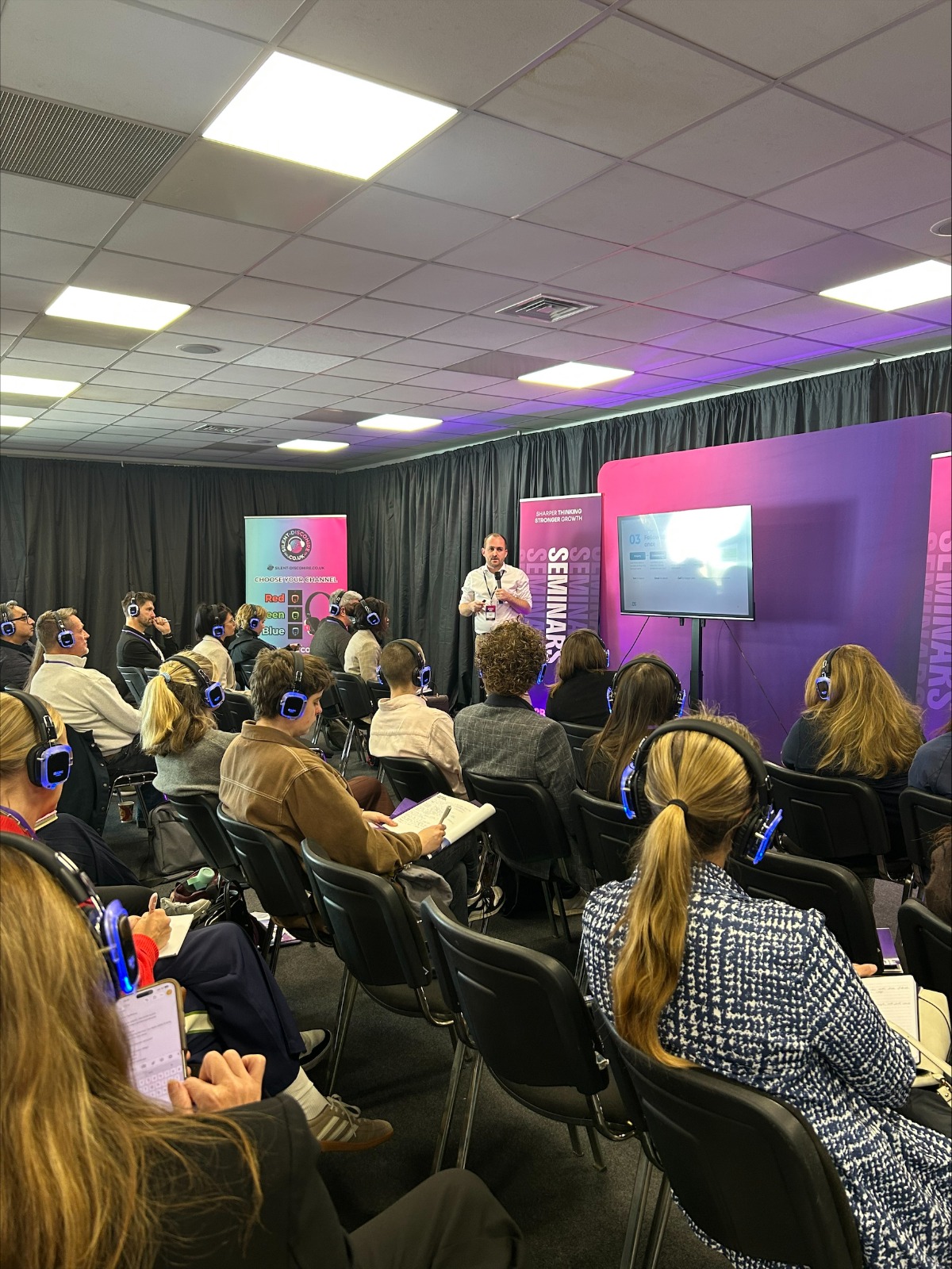 Dan Sagar giving The Follow-Up Gap talk to a seated audience at B2B Expos, Brighton