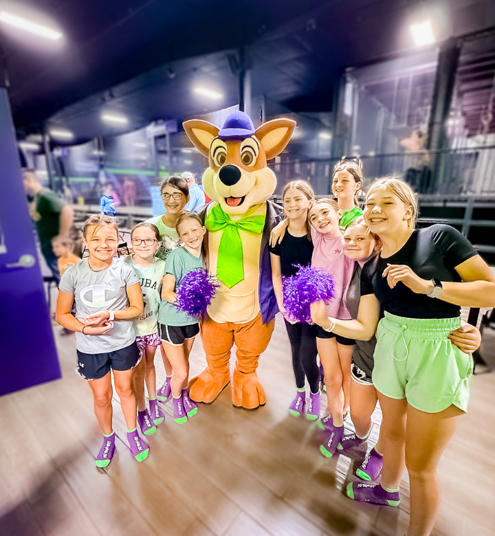 Metropolis Resort mascot, Splasharoo, at his birthday bash in Action City.
