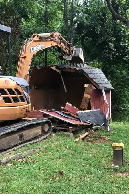 Truck hauling debris from a work site