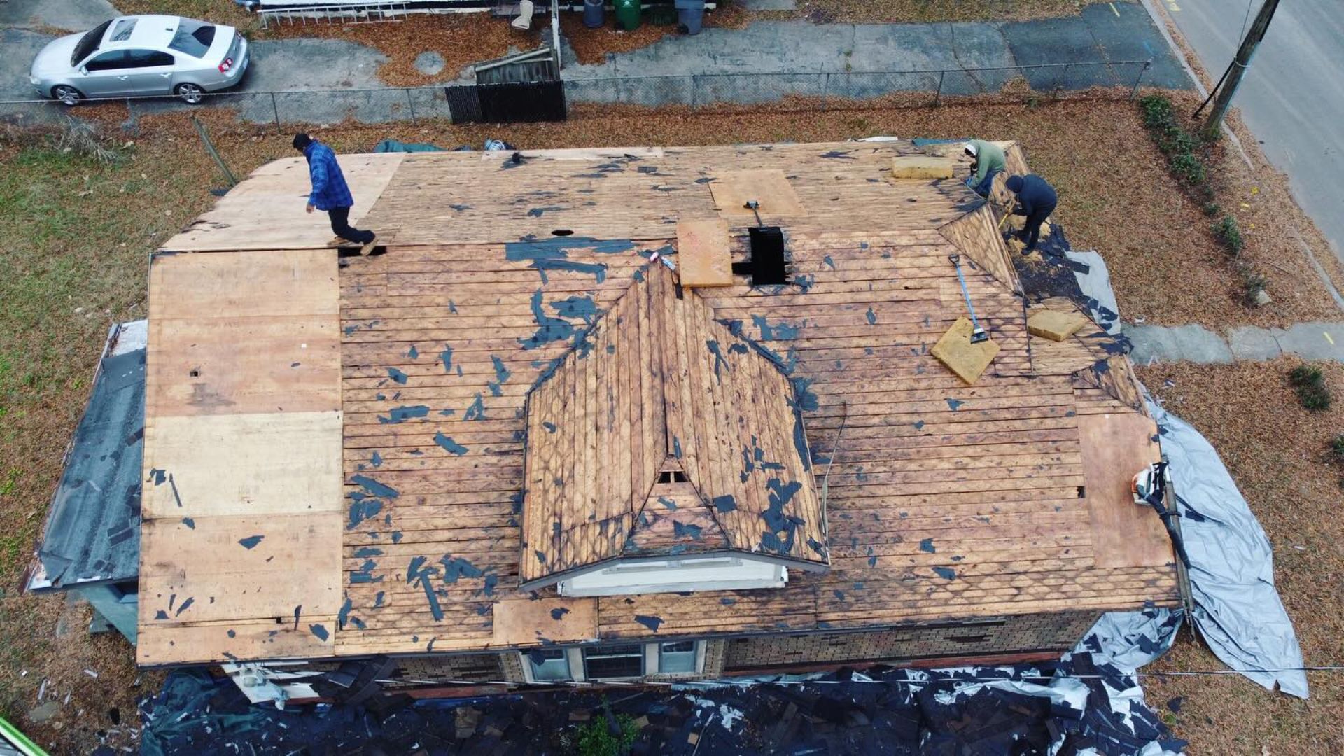 Construction crew with tools and equipment ready for a residential framing or renovation project.