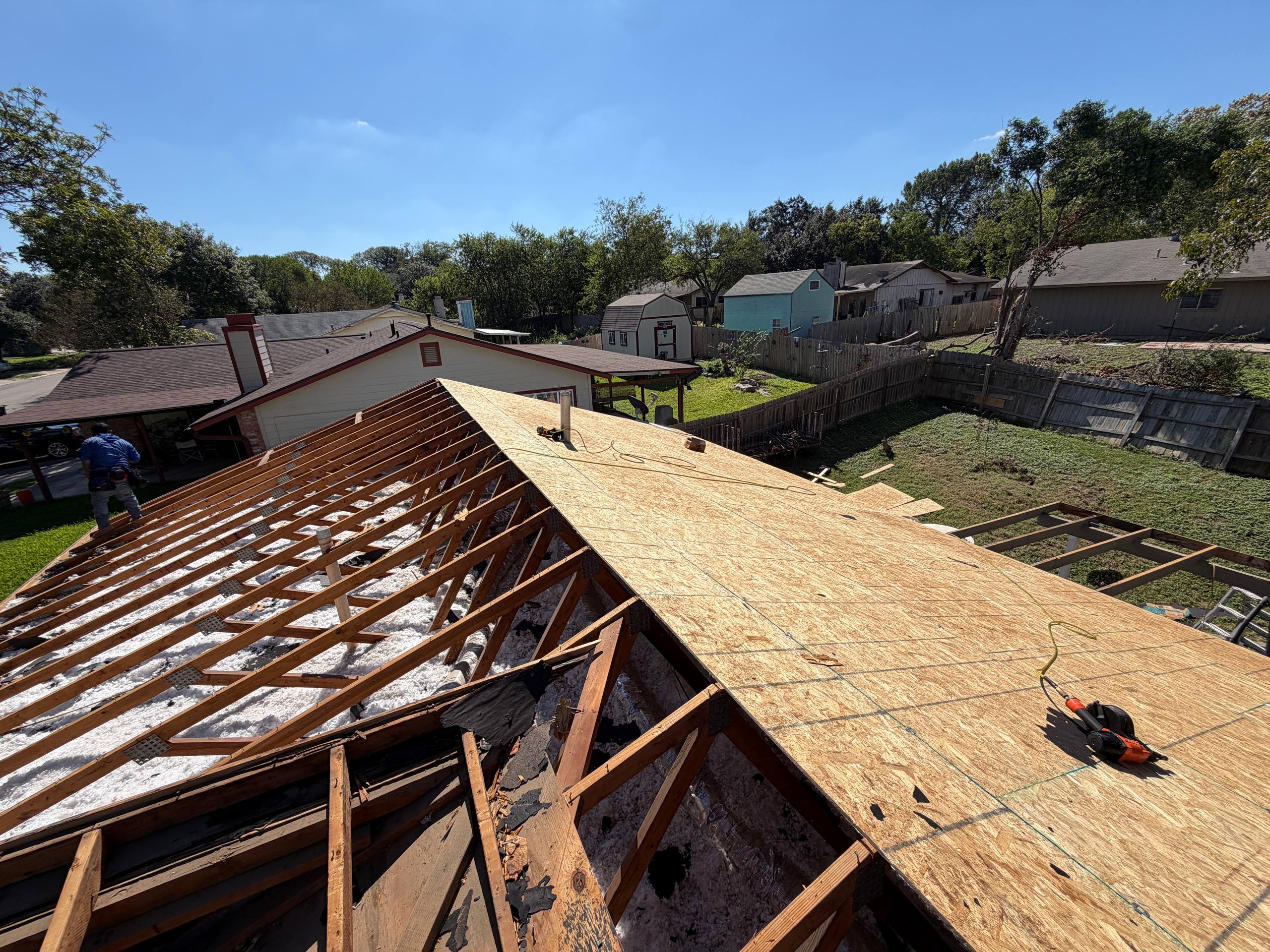 Exposed roof decking during full roof restoration