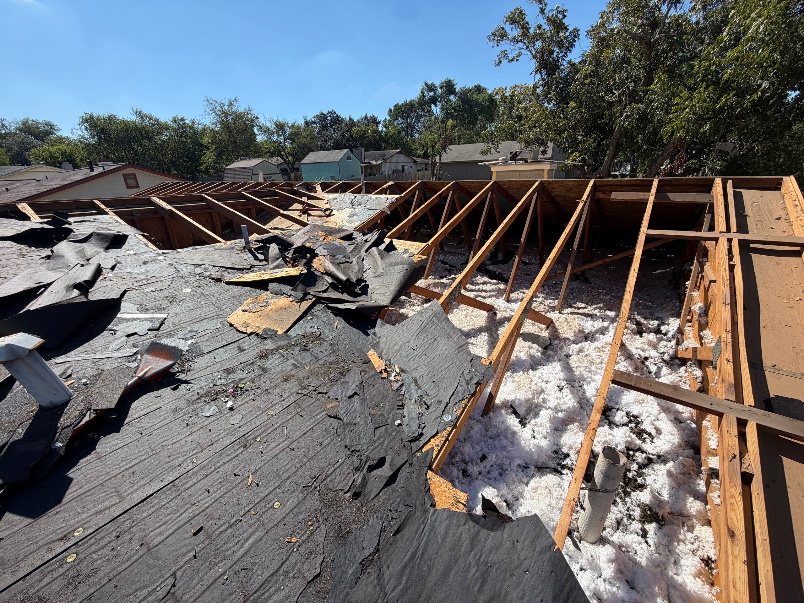 Roofing system rebuild in progress during full roof re-deck project