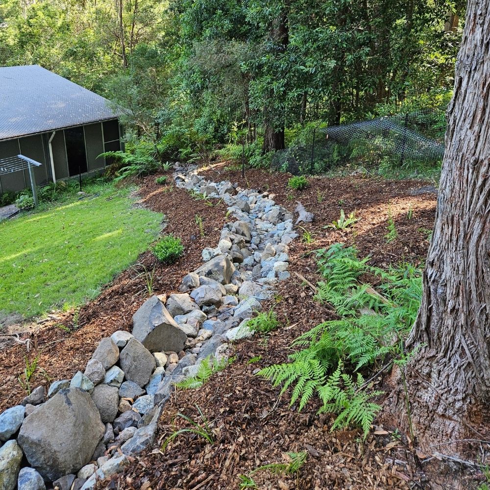 Landscape drainage solution built to follow land fall