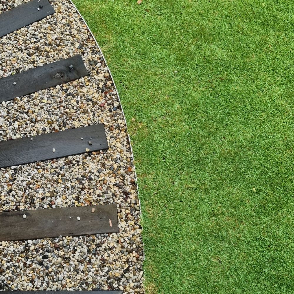 Stone garden steps built into sloped Sunshine Coast yard