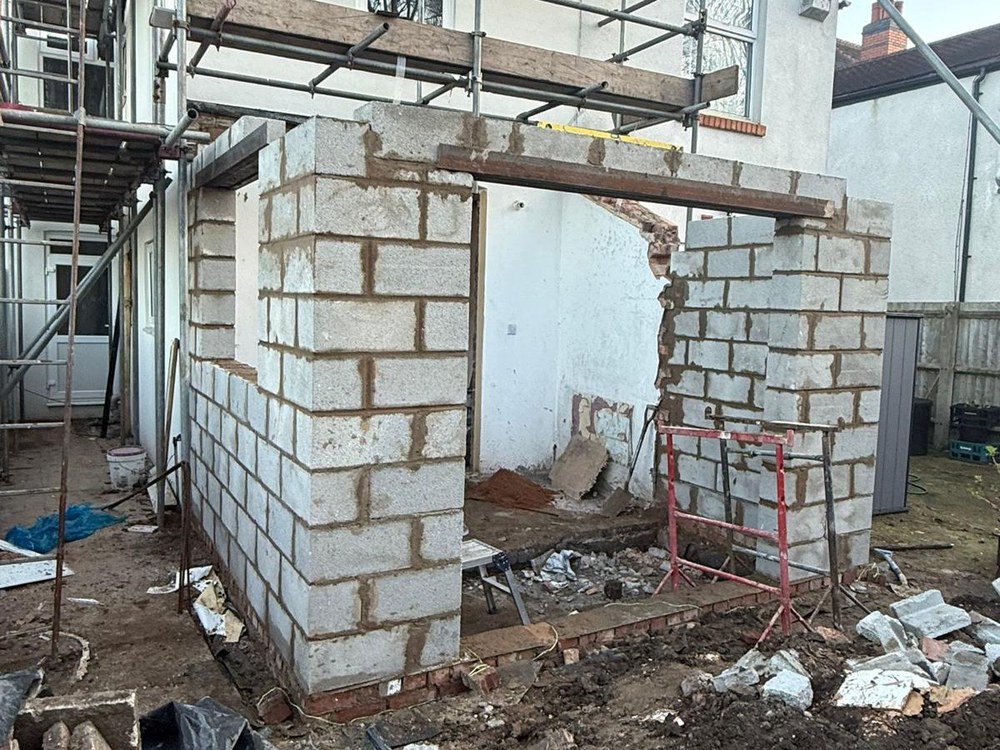 Extension elevation with scaffold