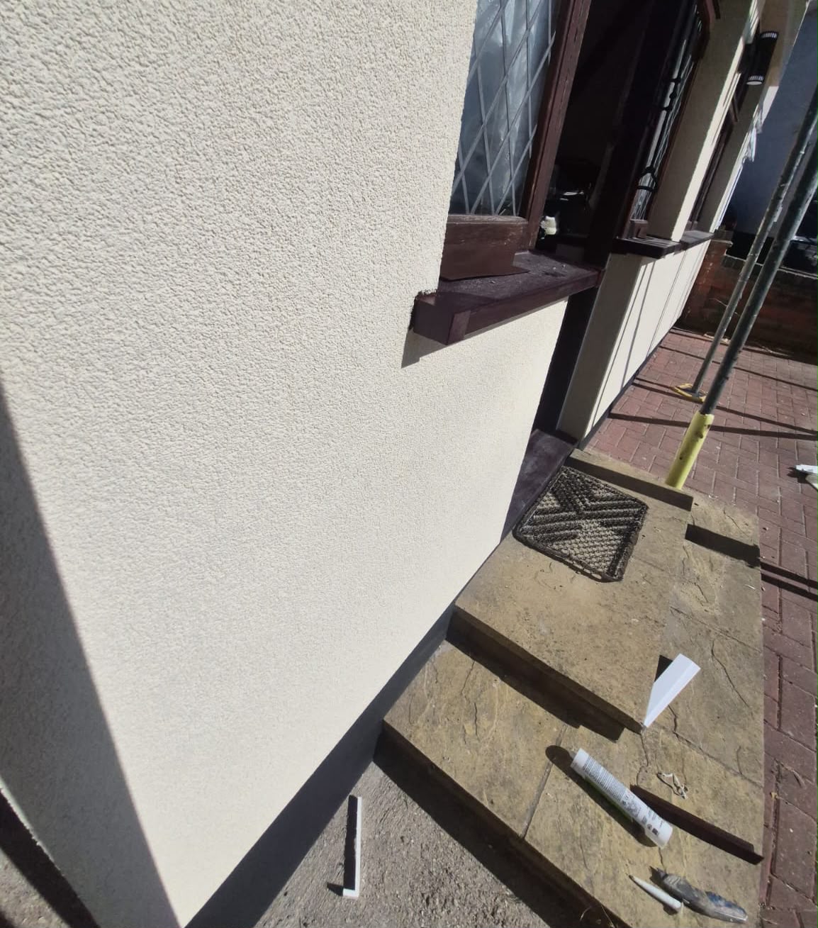 Render finish detail around window