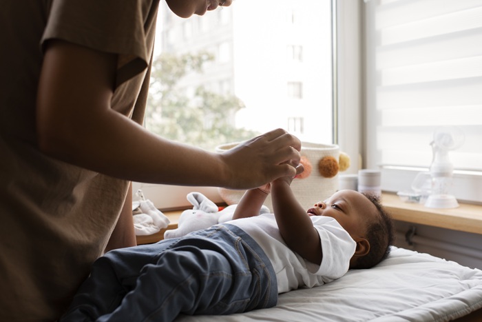 Family with newborn at pediatric chiropractic care clinic in North Chesterfield VA