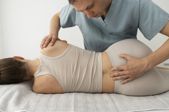 Patient feeling better after spinal adjustments at chiropractic clinic in North Chesterfield VA