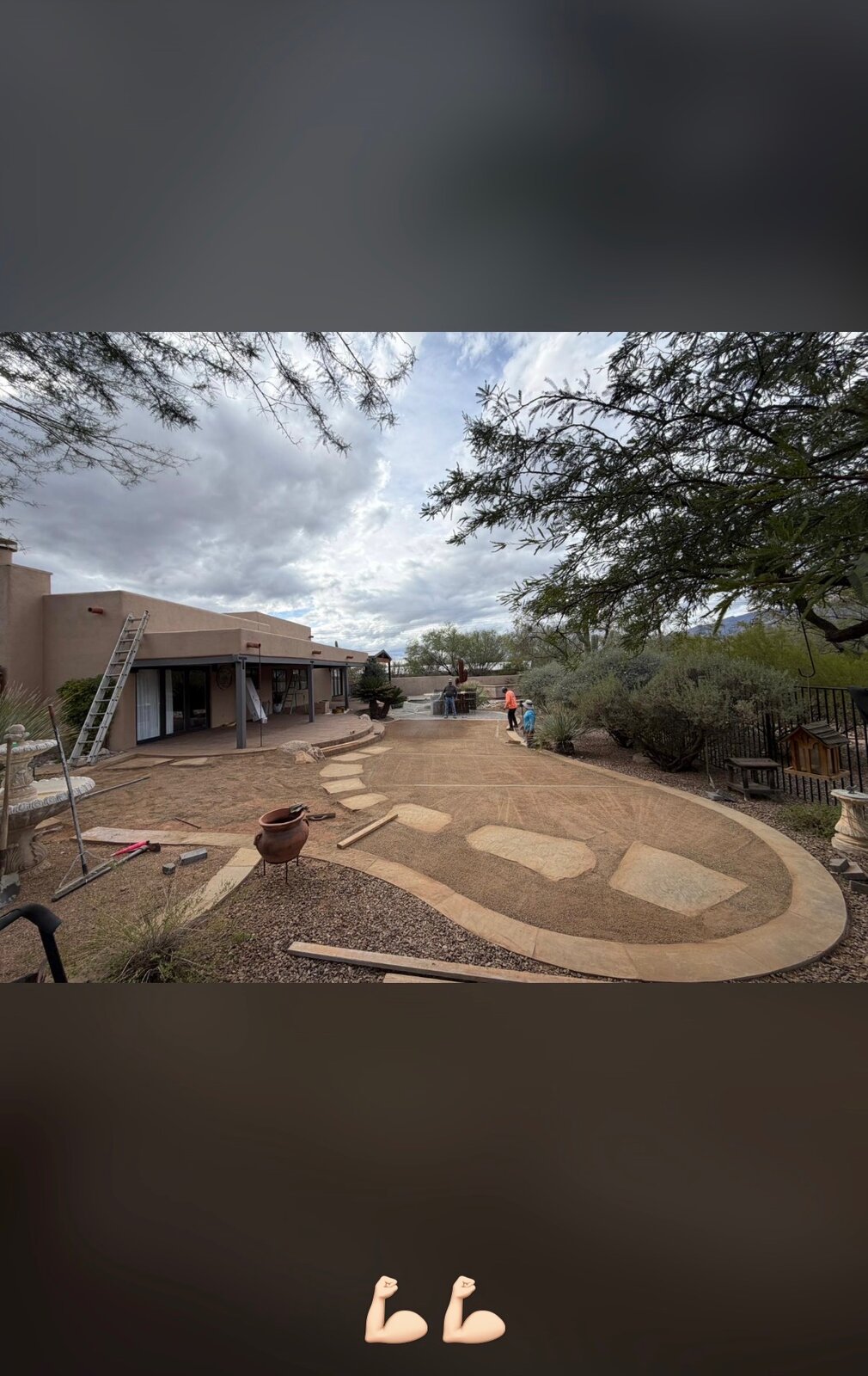 Backyard mid-installation, base and stepping stones being set