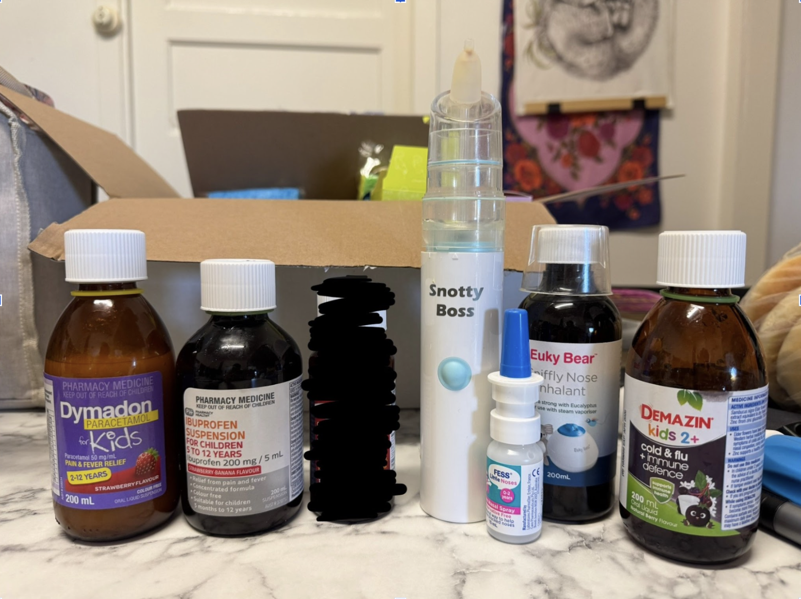A line up of different childrens cold and flu medications A line up of different childrens cold and flu medications