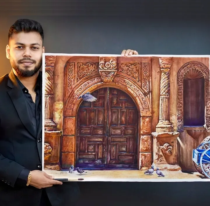 Artist Sachin with a finished realistic watercolor painting