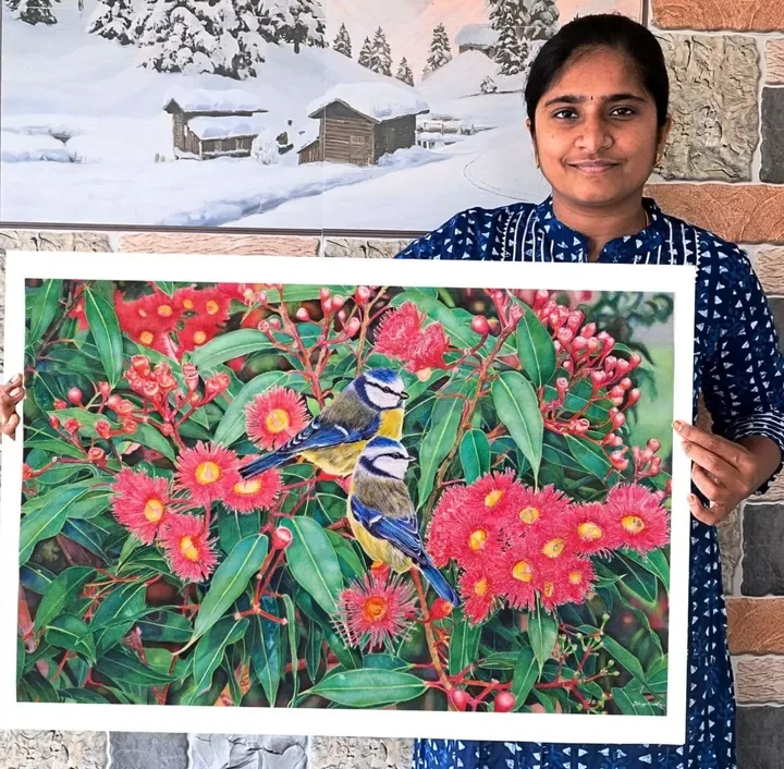 Dhivya Bharathi with a finished realistic watercolor painting