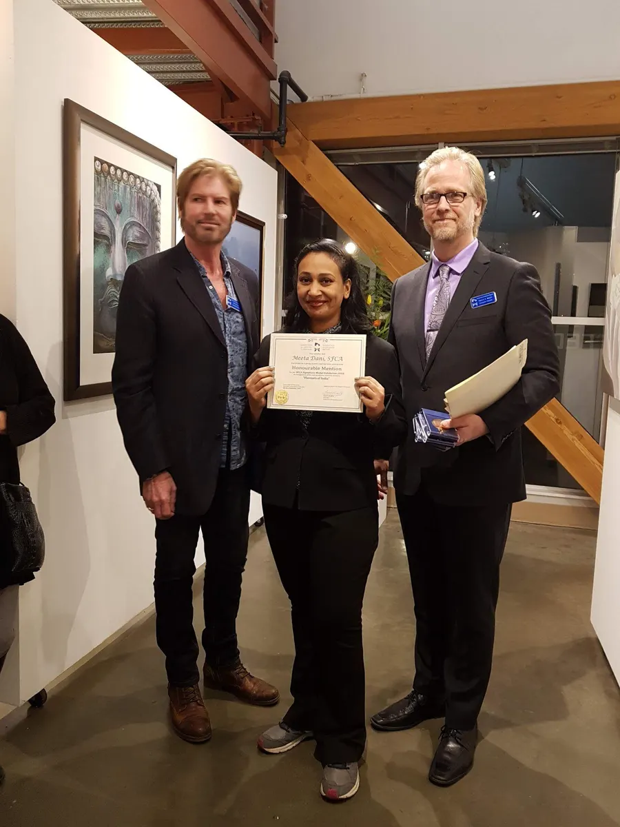 Meeta receiving an award at a Federation of Canadian Artists exhibition