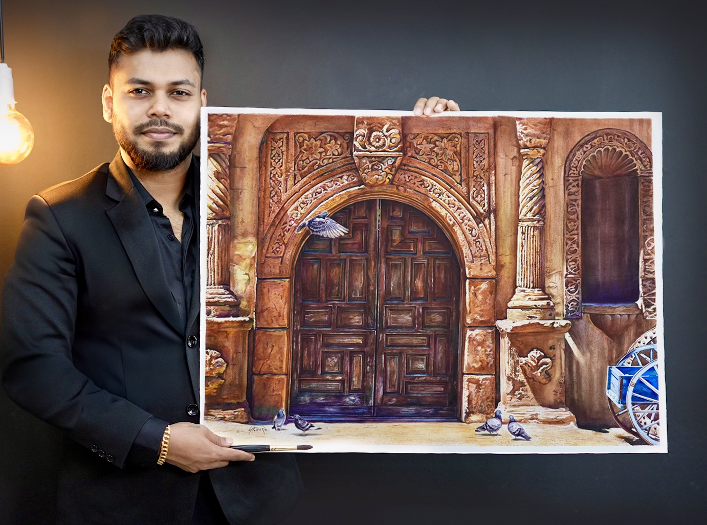 Artist Sachin with his painting The Timeless Portal