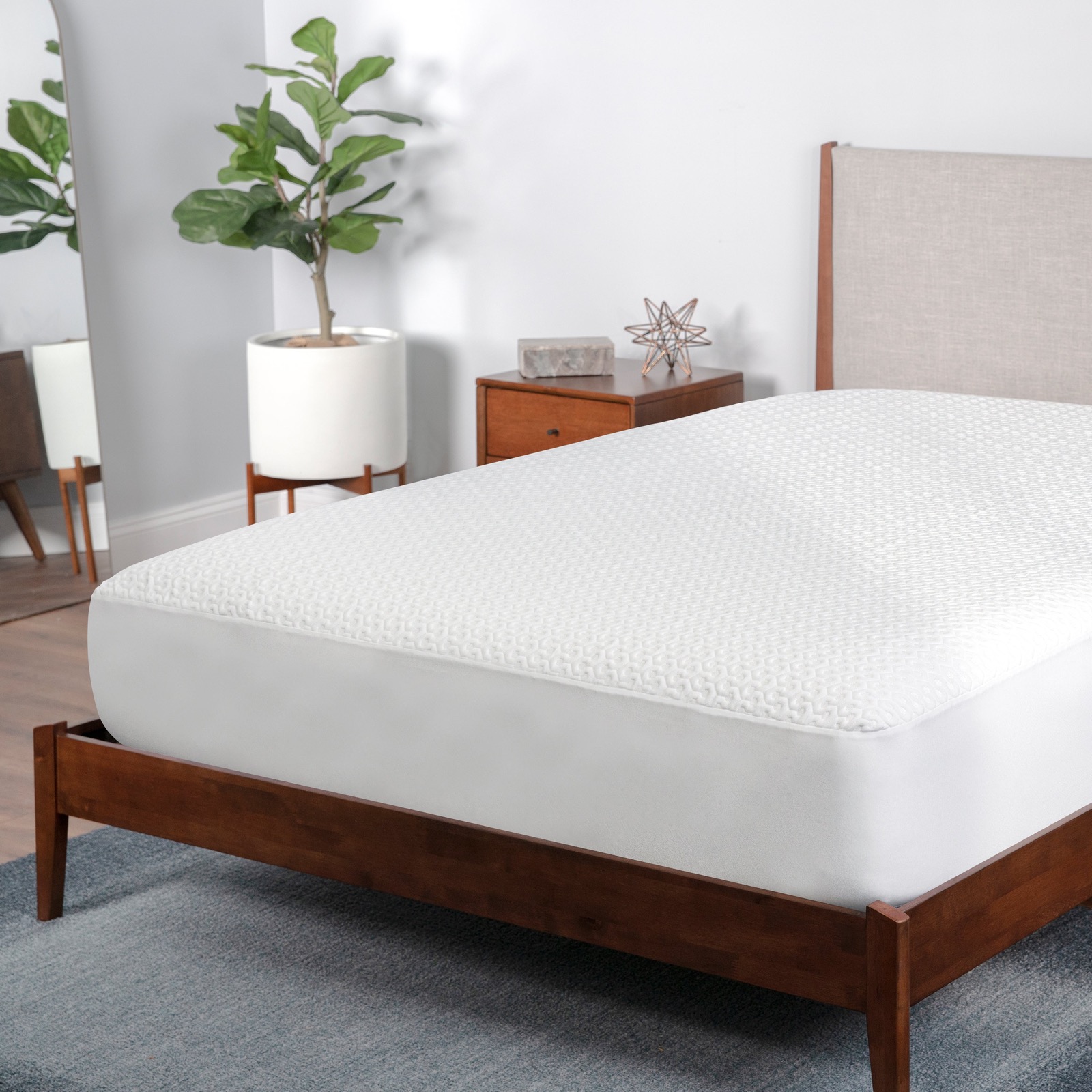 Bedgear Dri-Tec mattress protector on a bed