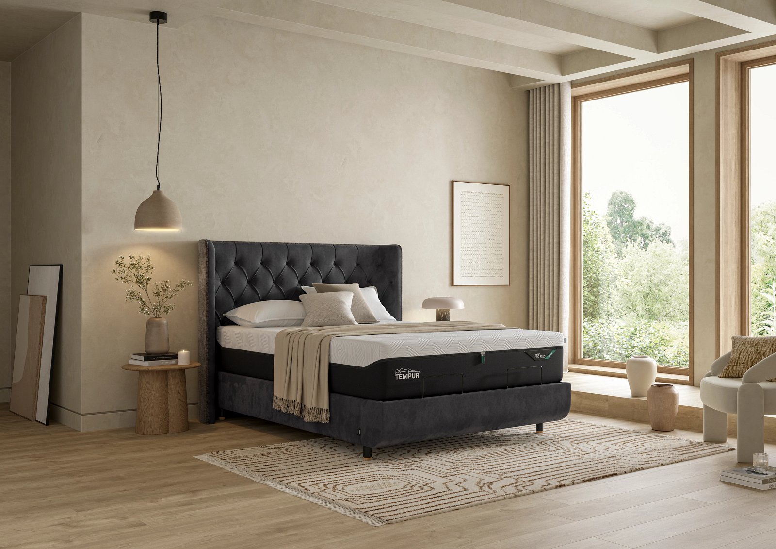 A TEMPUR mattress on an upholstered bed