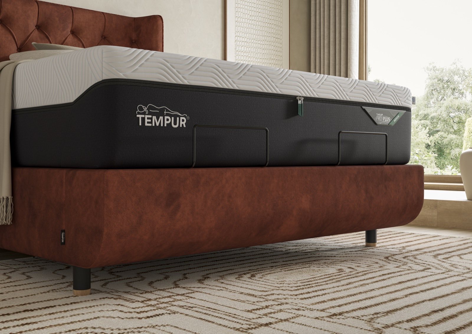 TEMPUR Pro Plus SmartCool mattress on an upholstered bed