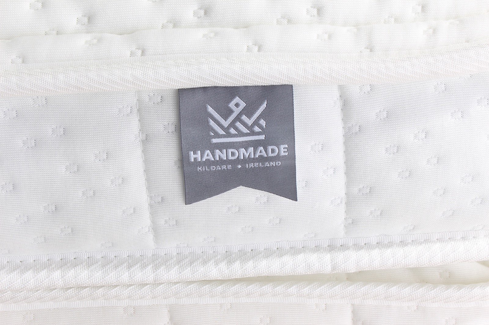 Snooze by King Koil Heritage mattress with crown badge
