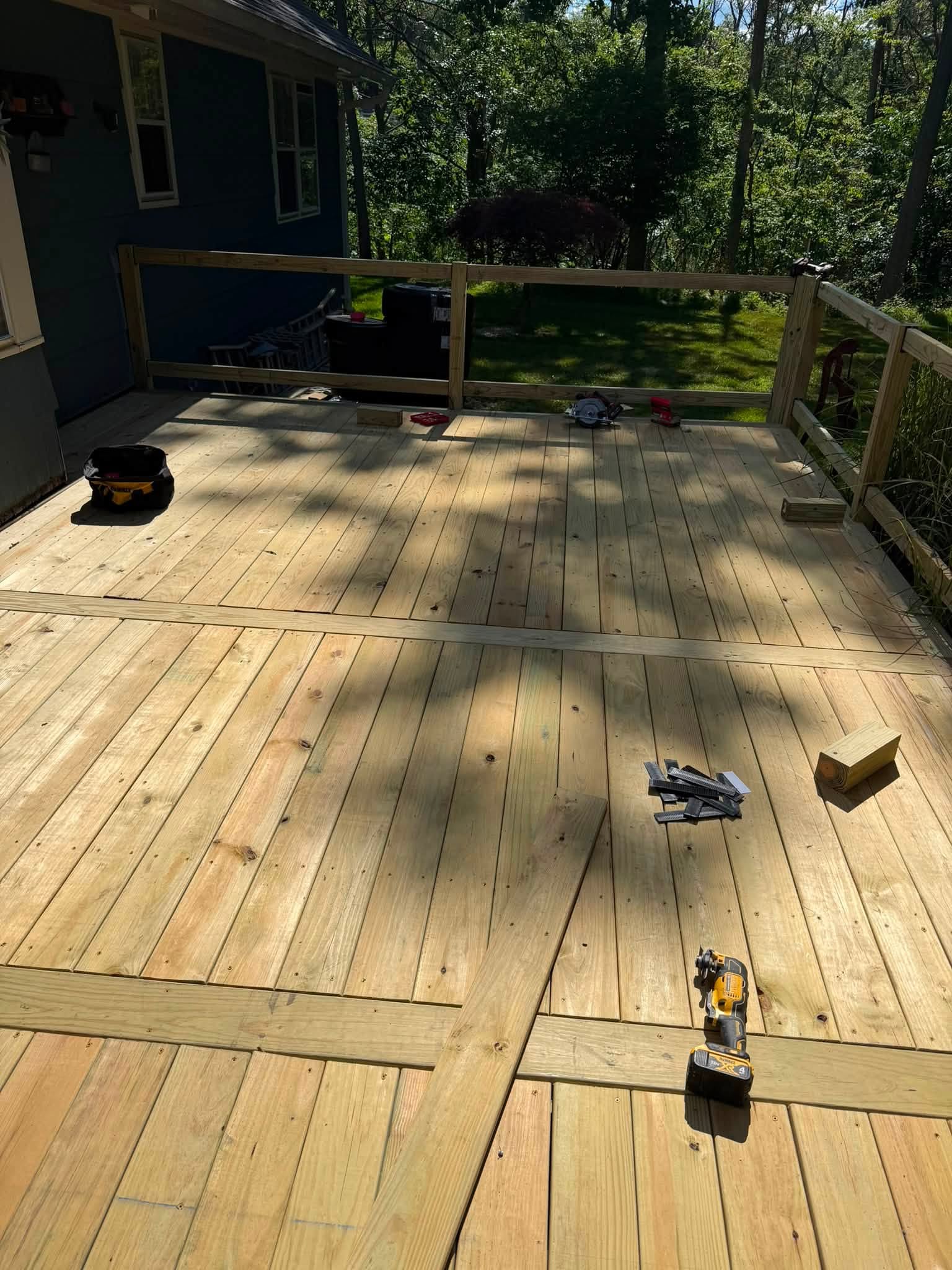 Wooden deck with tools and materials during construction