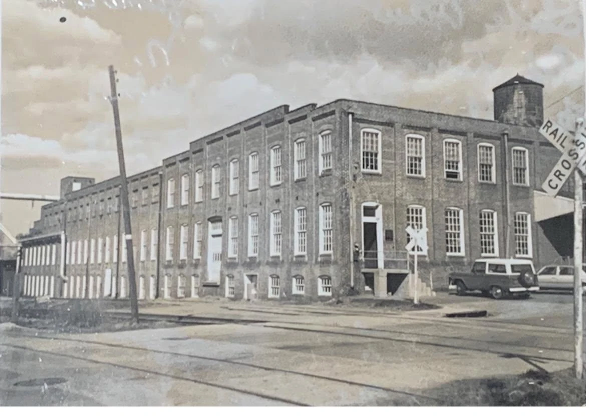 Historic black and white photograph of the Red Lion Table Company furniture factory building in Red Lion, Pennsylvania, the same building that now houses Black Cap Brewing Company