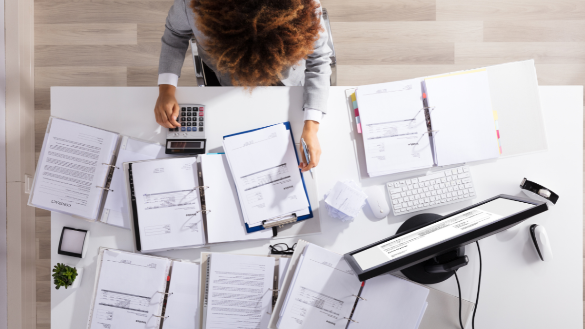 Organized small business financial records being reviewed before applying for a business loan