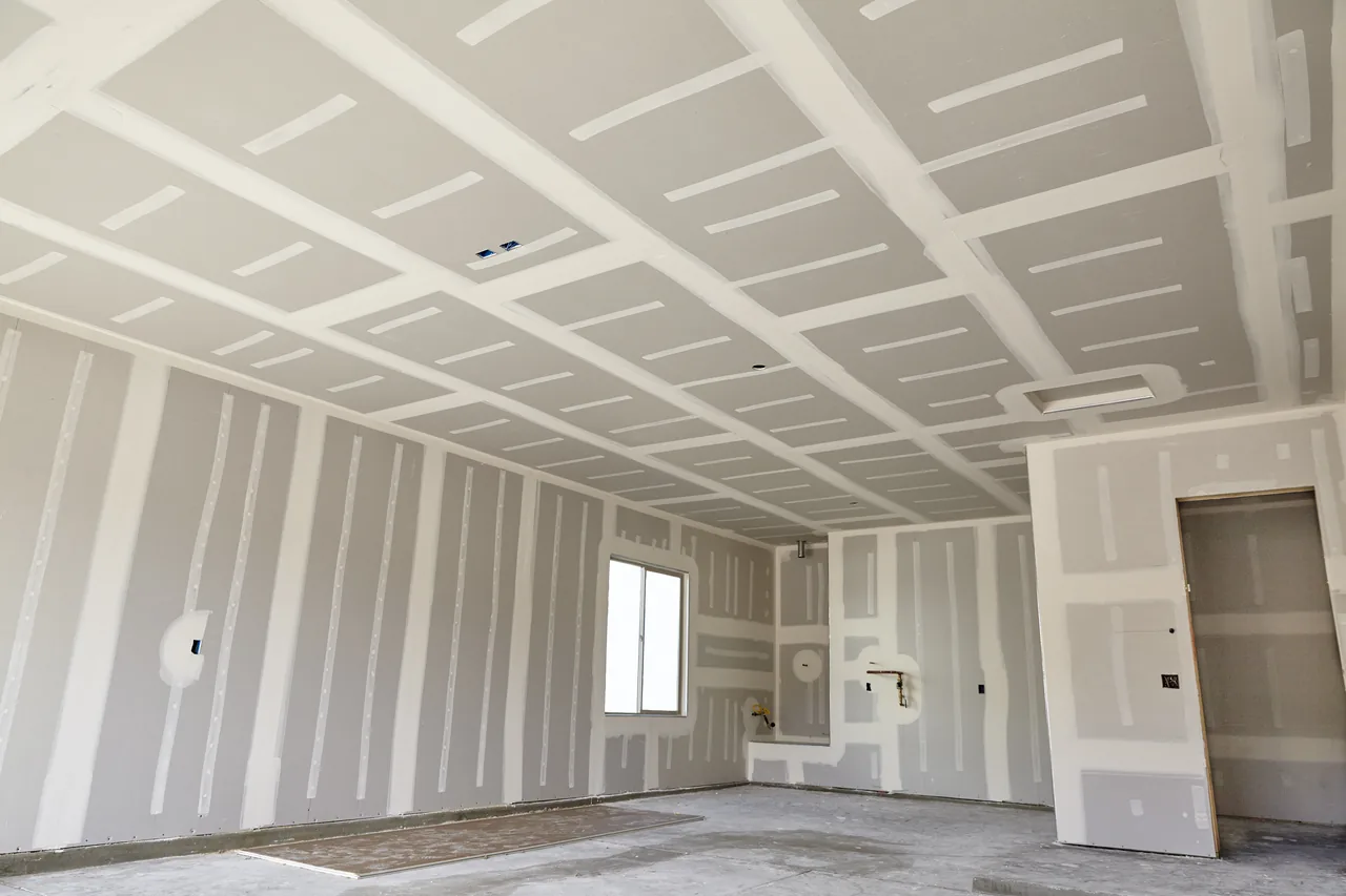 Interior framing and drywall installation in progress