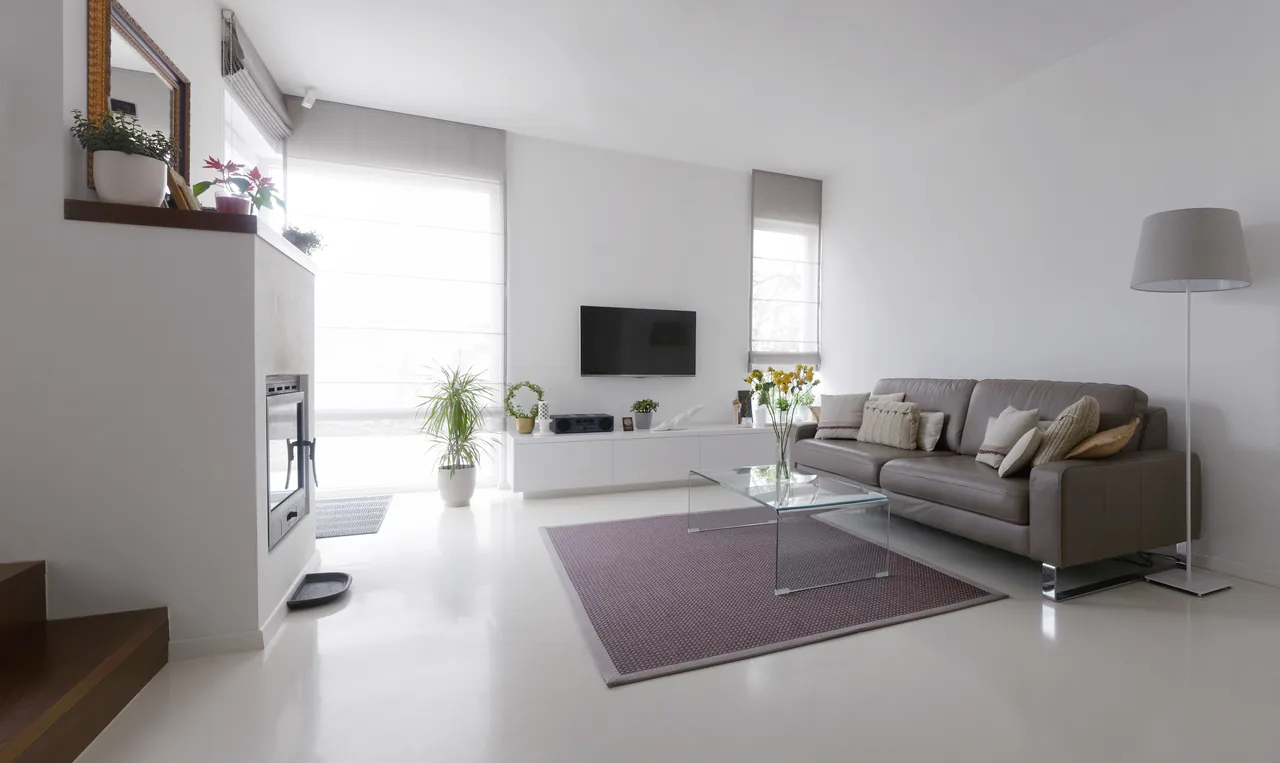 Remodeled living space with new flooring and a clean finished interior