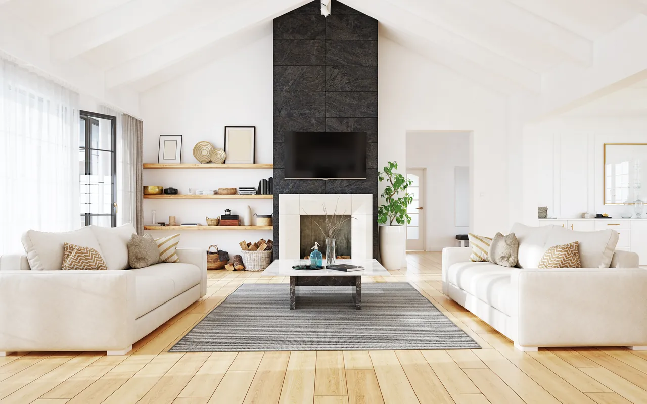 Remodeled living room with a fireplace and built-in shelving