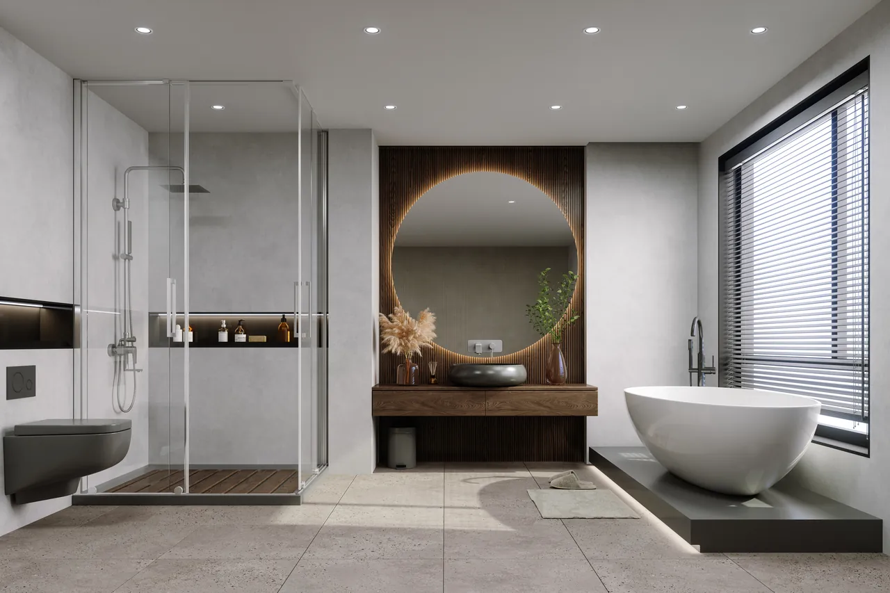 Modern bathroom remodel with a glass shower, round mirror, and soaking tub