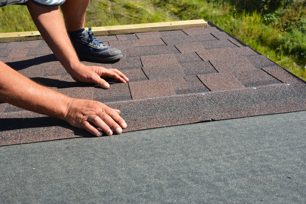 Roofing Contractor in Charlotte, NC working on a home roof