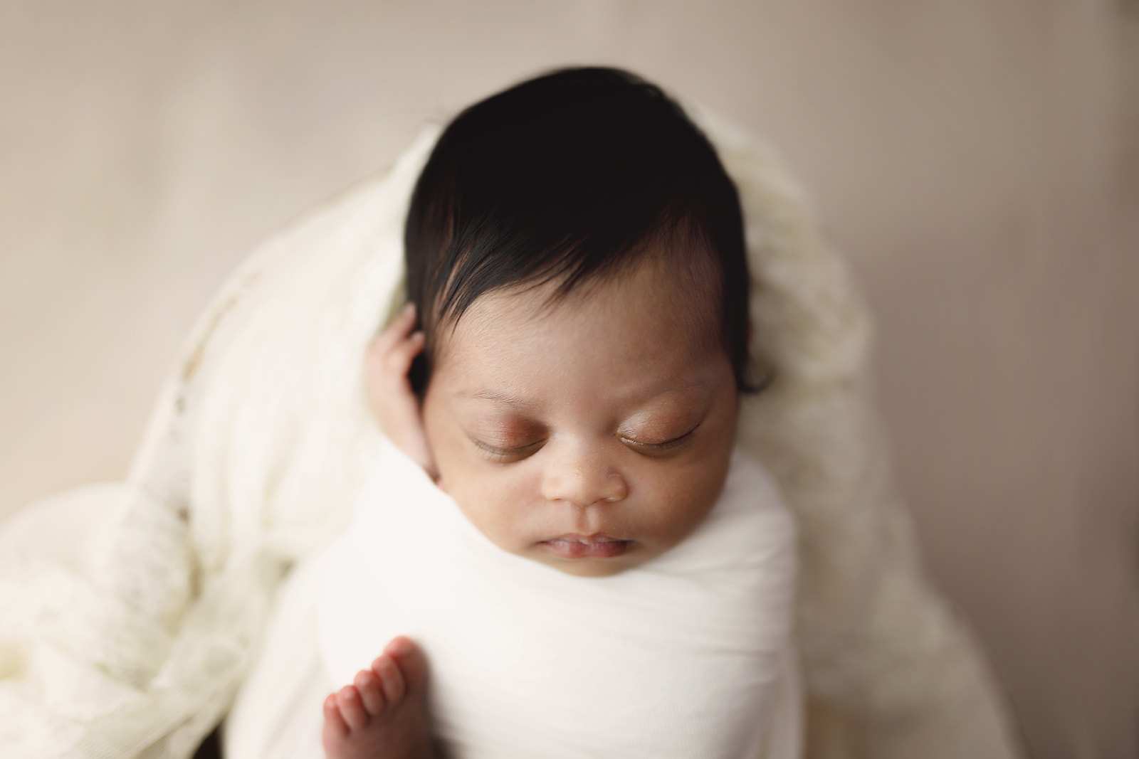 White bed newborn
